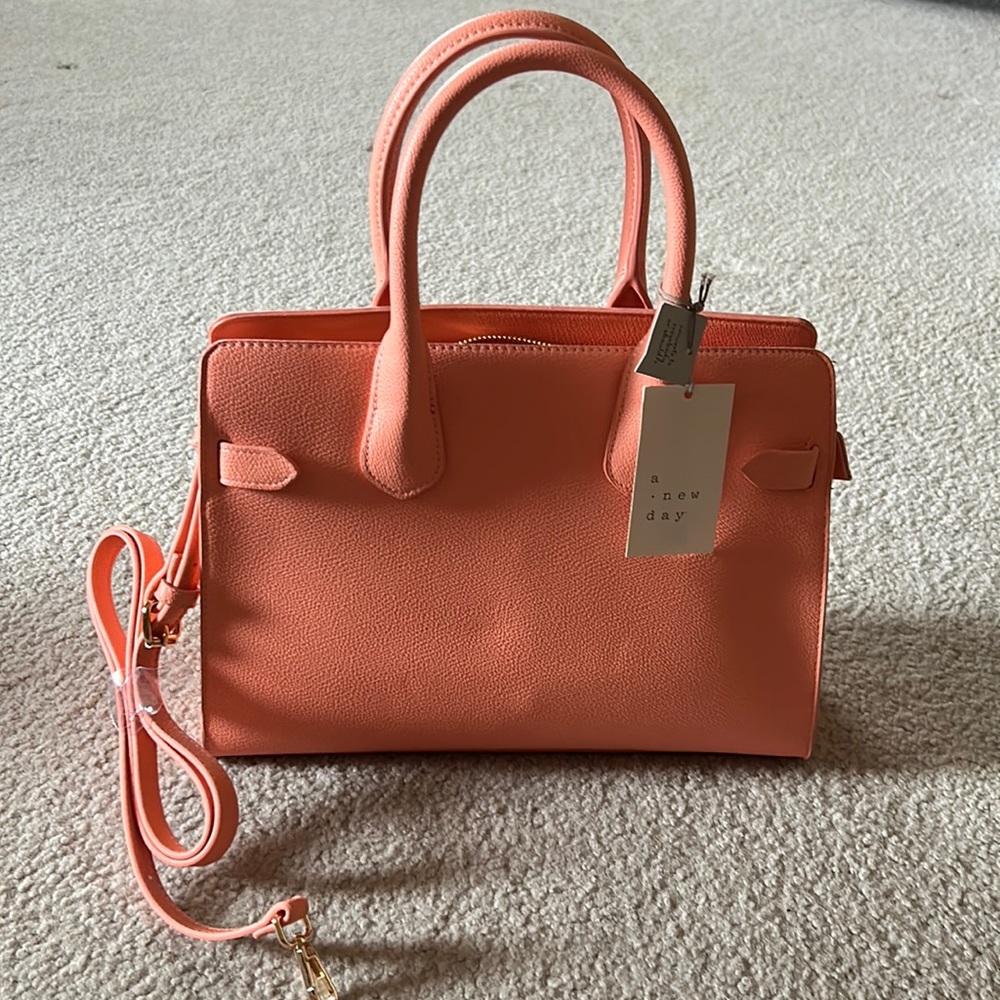 A beautiful Spring bag, coral color. Never used. Smoke free home.